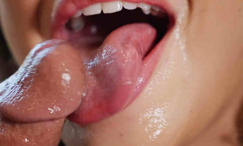 Blow VR studio promo video screenshot of a tongue licking the tip of a cock